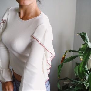 Club Monaco white sweater with ruffled sleeves